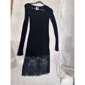 Black long sleeve woman’s dress BCBG MAXAZRIA with lace at the bottom size S